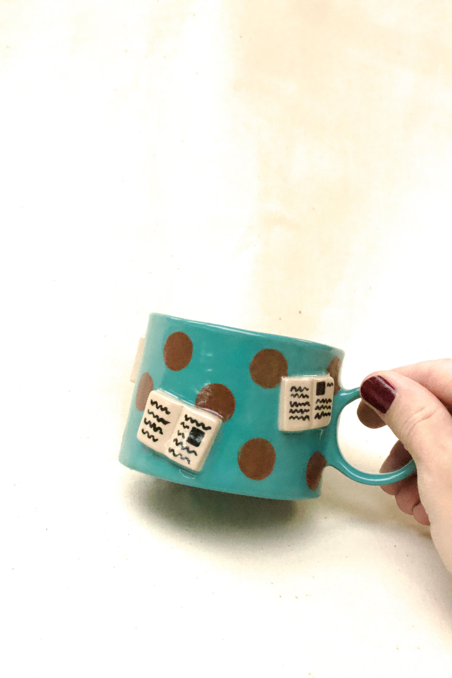 books + polka coffee cup (aqua/chocolate)