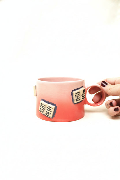 books + gradient coffee cup (rouge/baby pink)