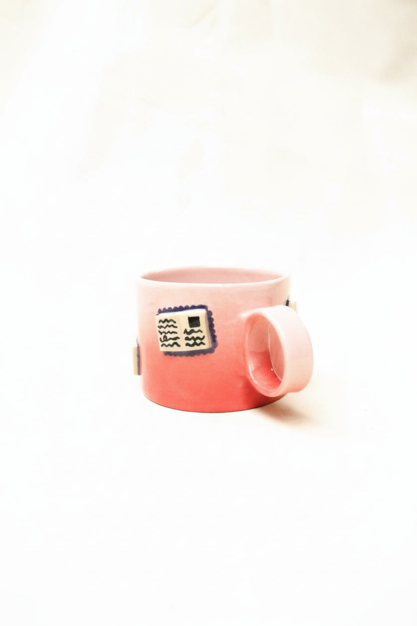 books + gradient coffee cup (rouge/baby pink)