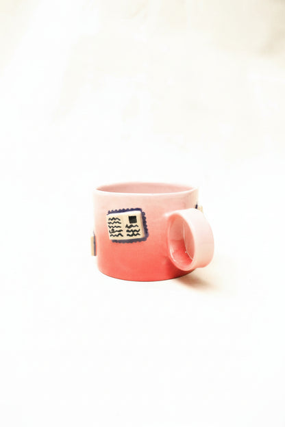 books + gradient coffee cup (rouge/baby pink)