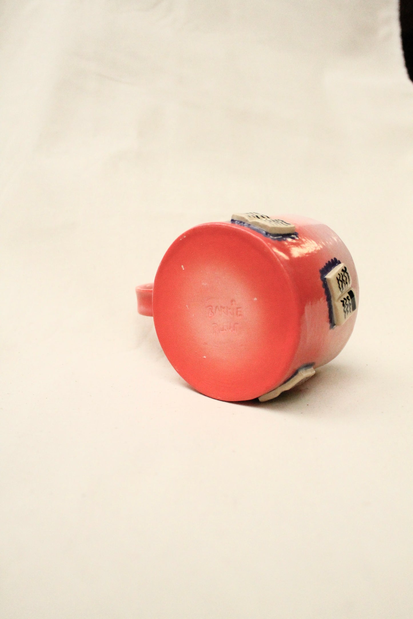 books + gradient coffee cup (rouge/baby pink)