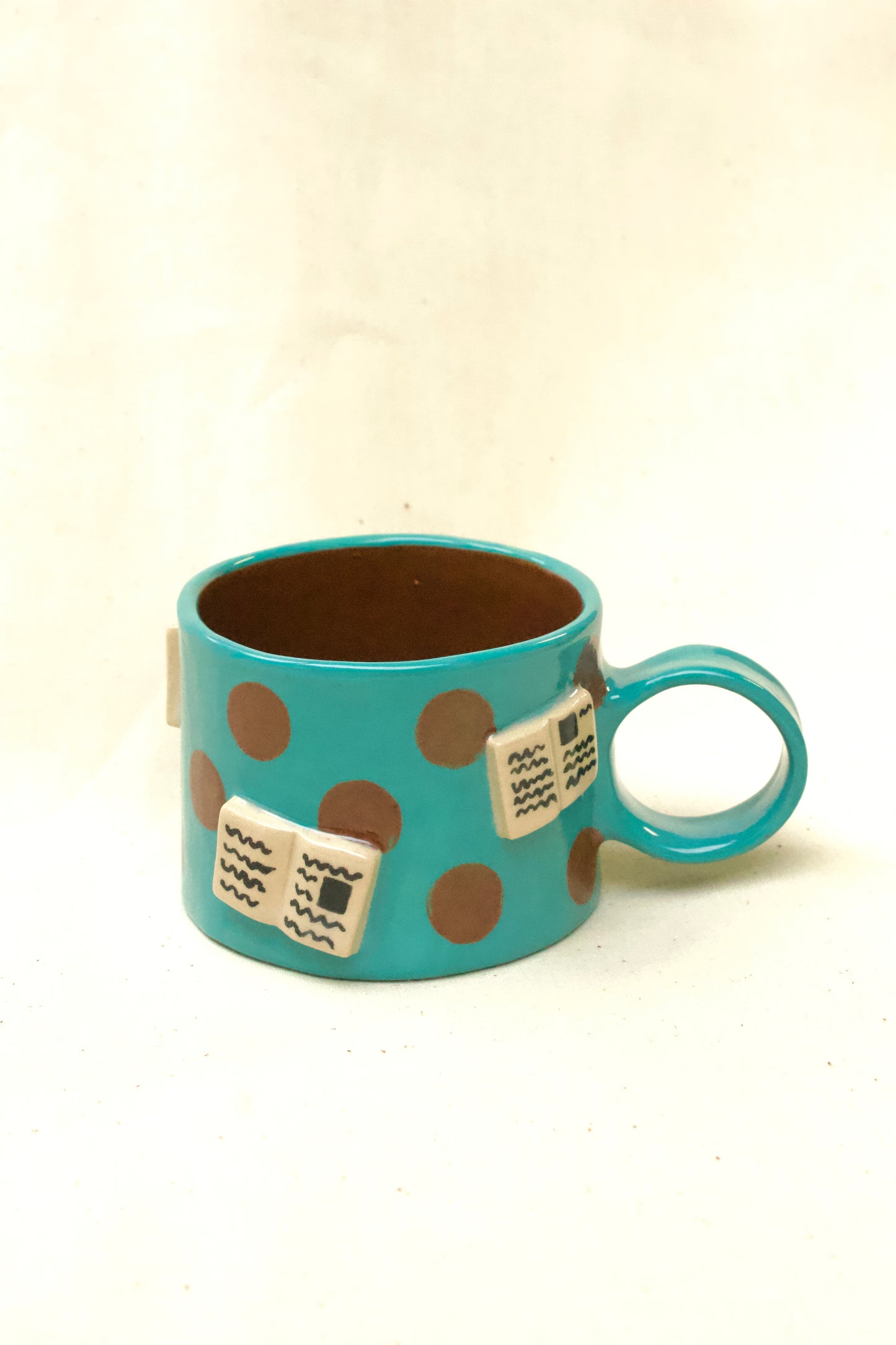 books + polka coffee cup (aqua/chocolate)