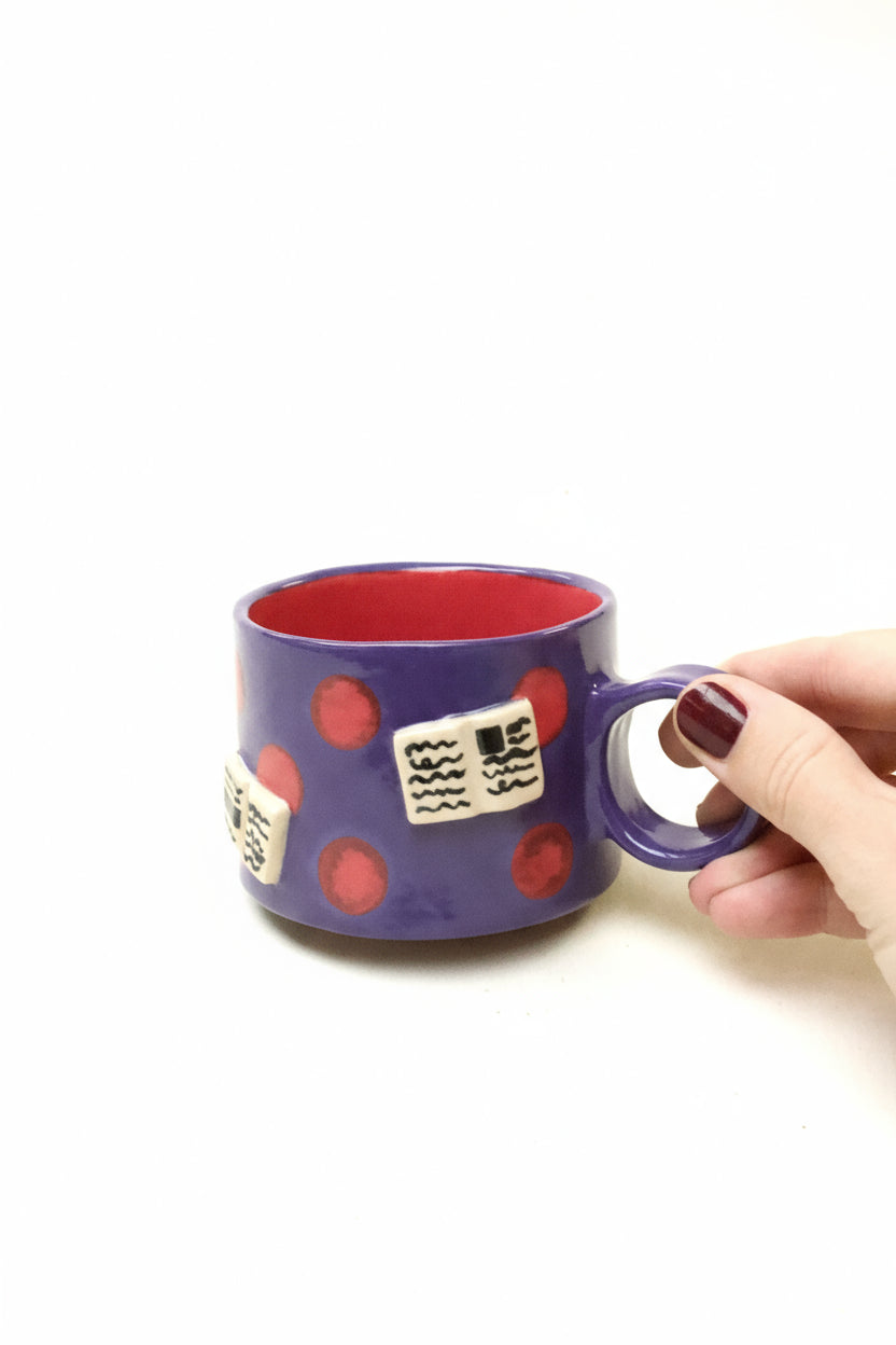 books + polka coffee cup (amethyst/ruby)