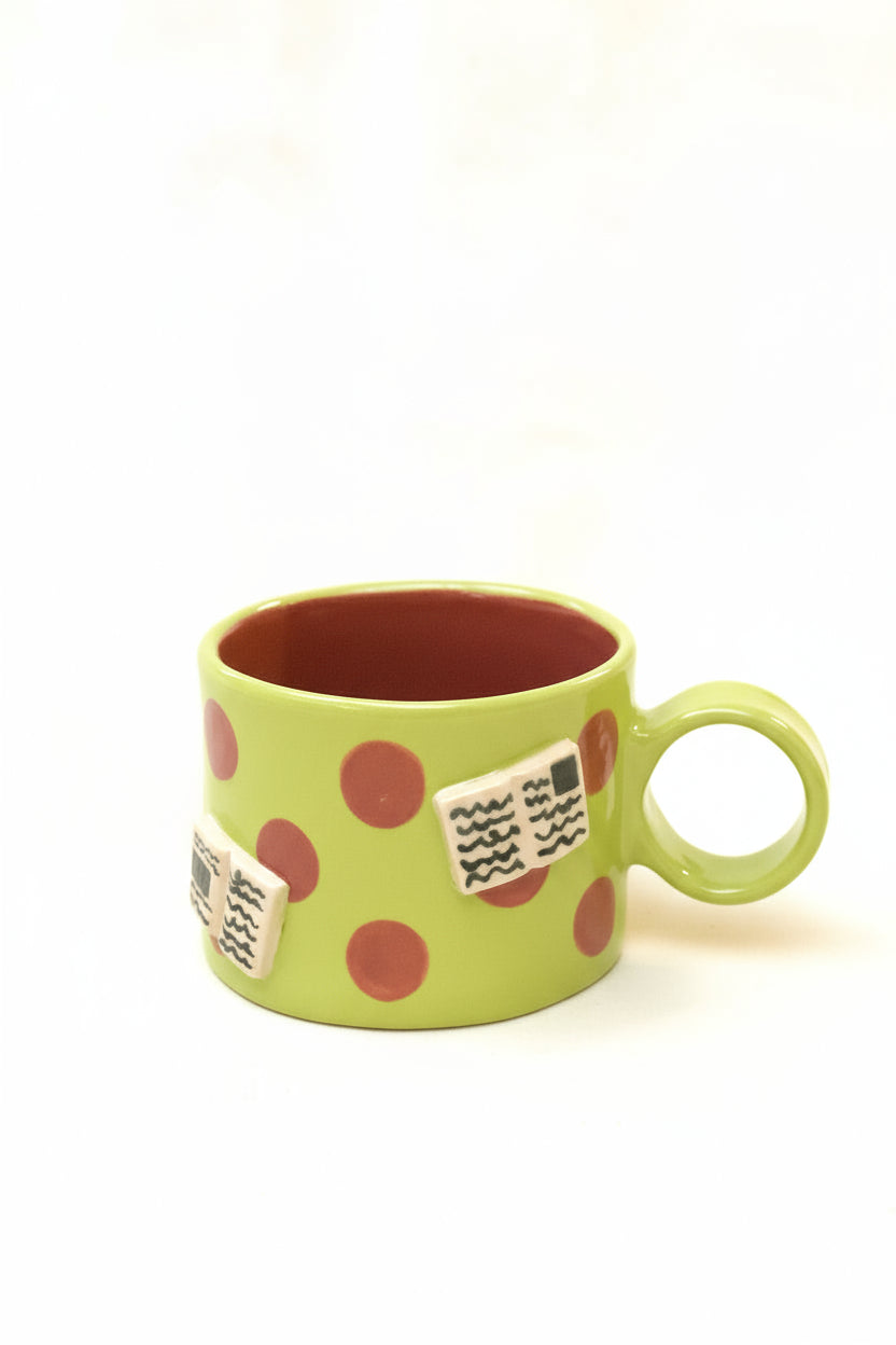 books + polka coffee cup (chartreuse/plum)