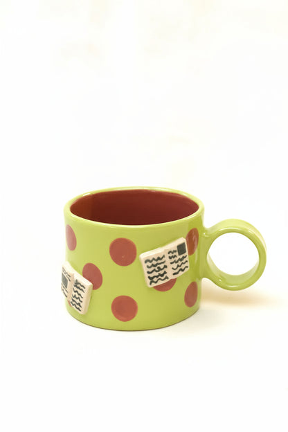 books + polka coffee cup (chartreuse/plum)
