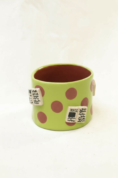 books + polka coffee cup (chartreuse/plum)