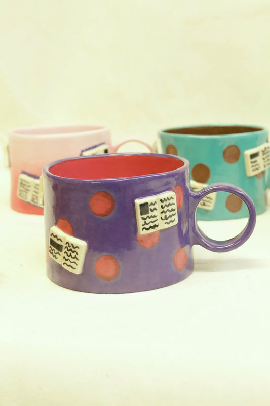 books + polka mug (amethyst/ruby)